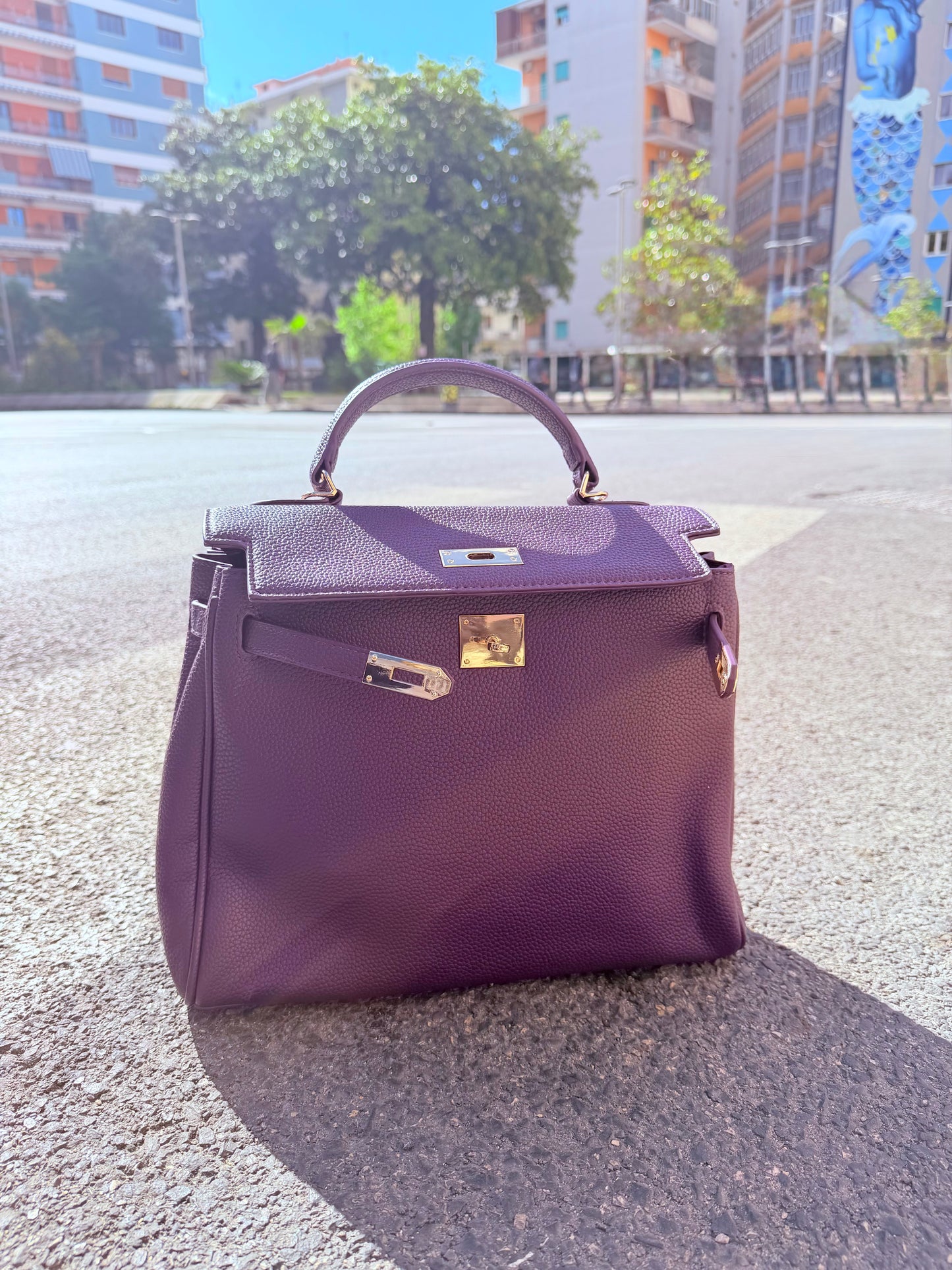 Borsa viola martellata